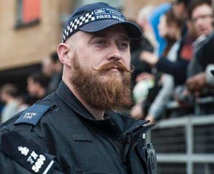 Uzun sakallı polis, çenesine file takacak