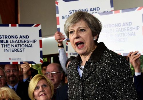 May warns ministers against complacency