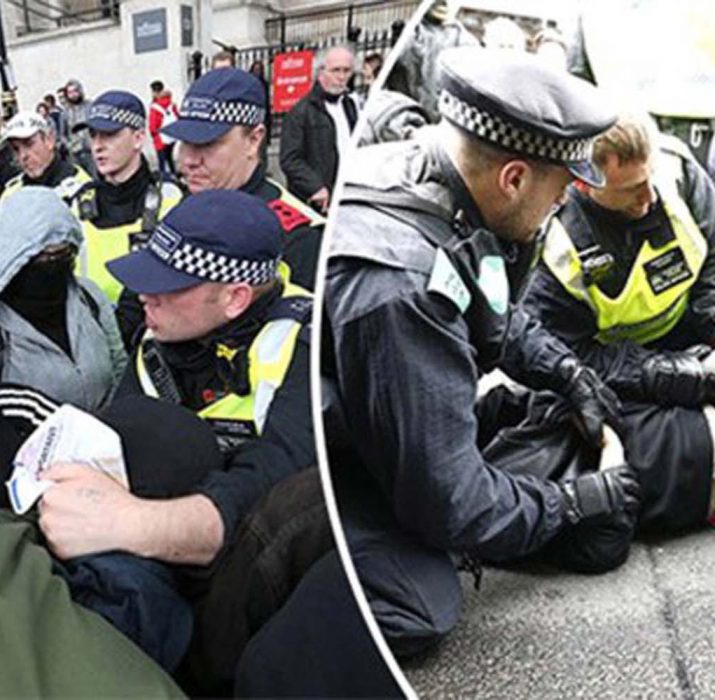 Police make 14 arrests as rival groups clash at joint Britain First-EDL protest in London