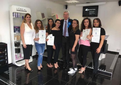 Turkish descent hairdressers handed diplomas by Nick de Bois