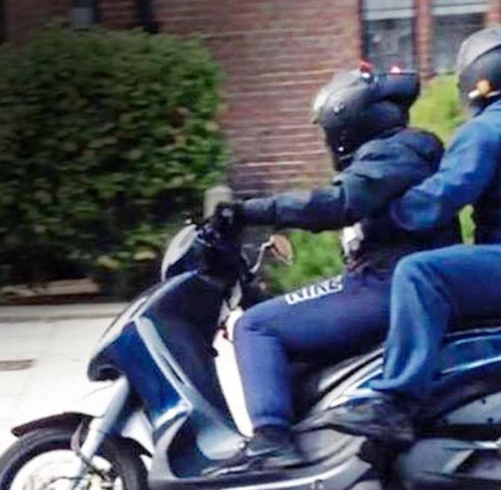 Moped thugs threaten baby with huge knife during terrifying street robbery