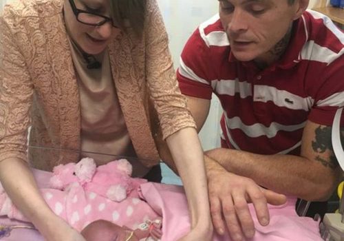 Baby born with heart outside body ‘doing well’