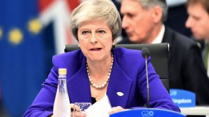 Brexit: May wins by 317 to 301 but only if the EU agrees