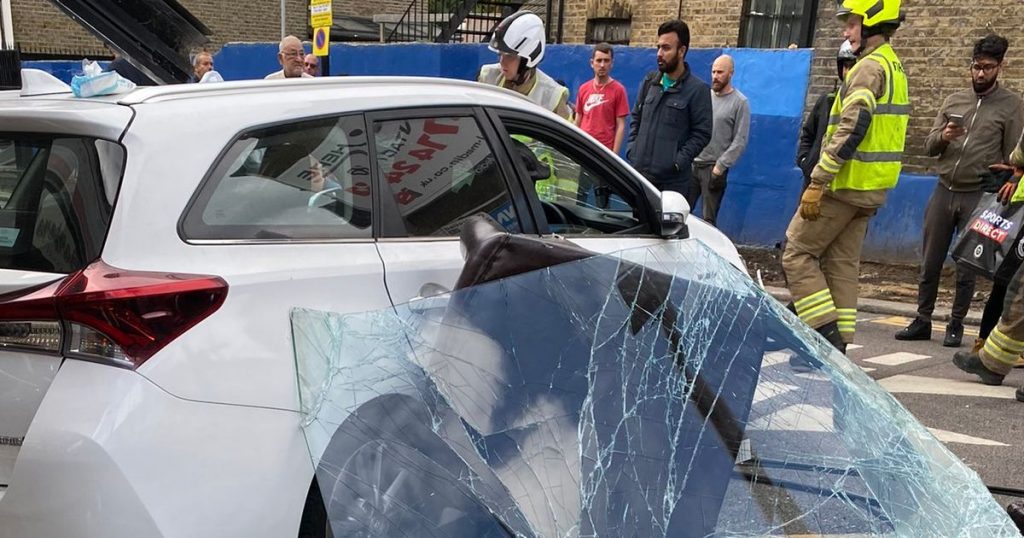 Five people hospitalized after car smashes into barbers