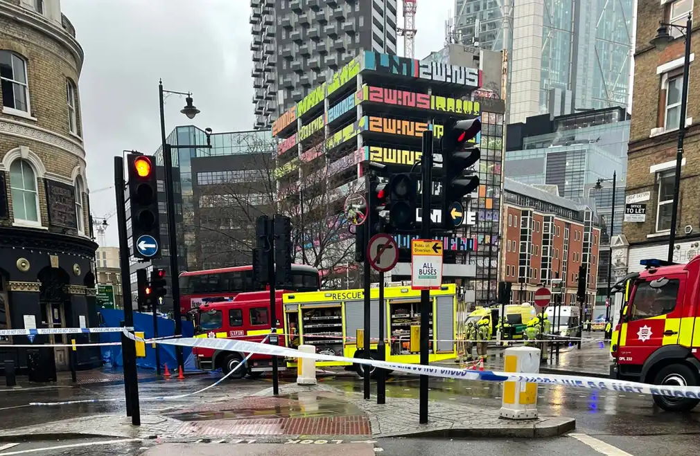 Woman killed after being hit by London bus in Shoreditch