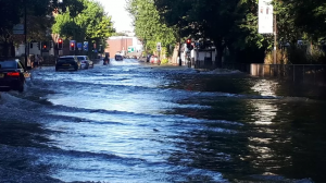 Burst water main flooding streets in Islington