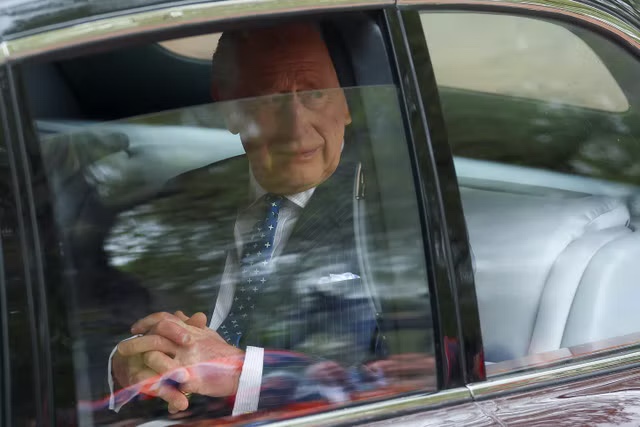 King Charles III arrives at Buckingham Palace ahead of ceremony