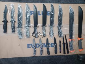 Man in custody for carrying 18 knives